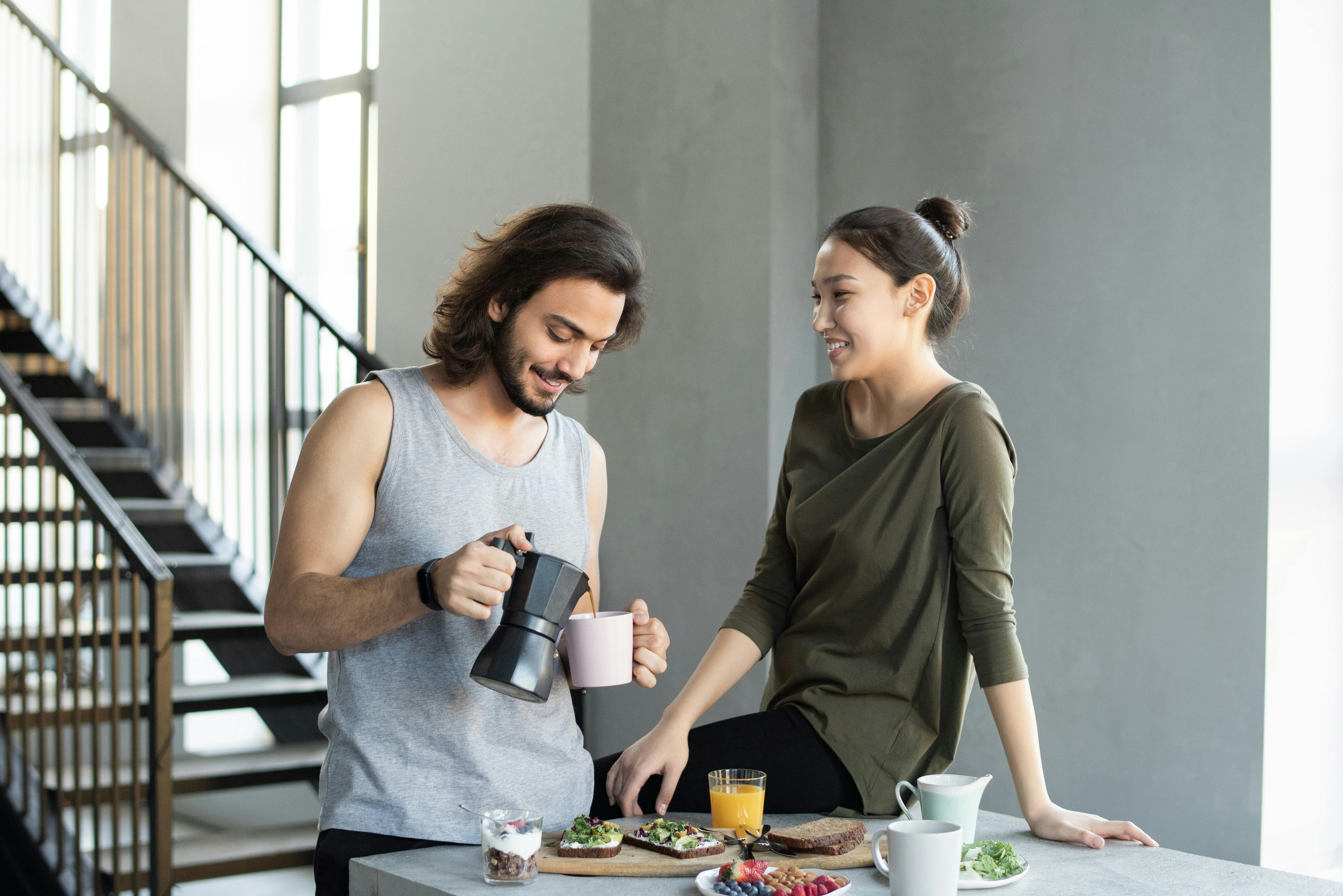 A happy couple having breakfast | Source: Pexels