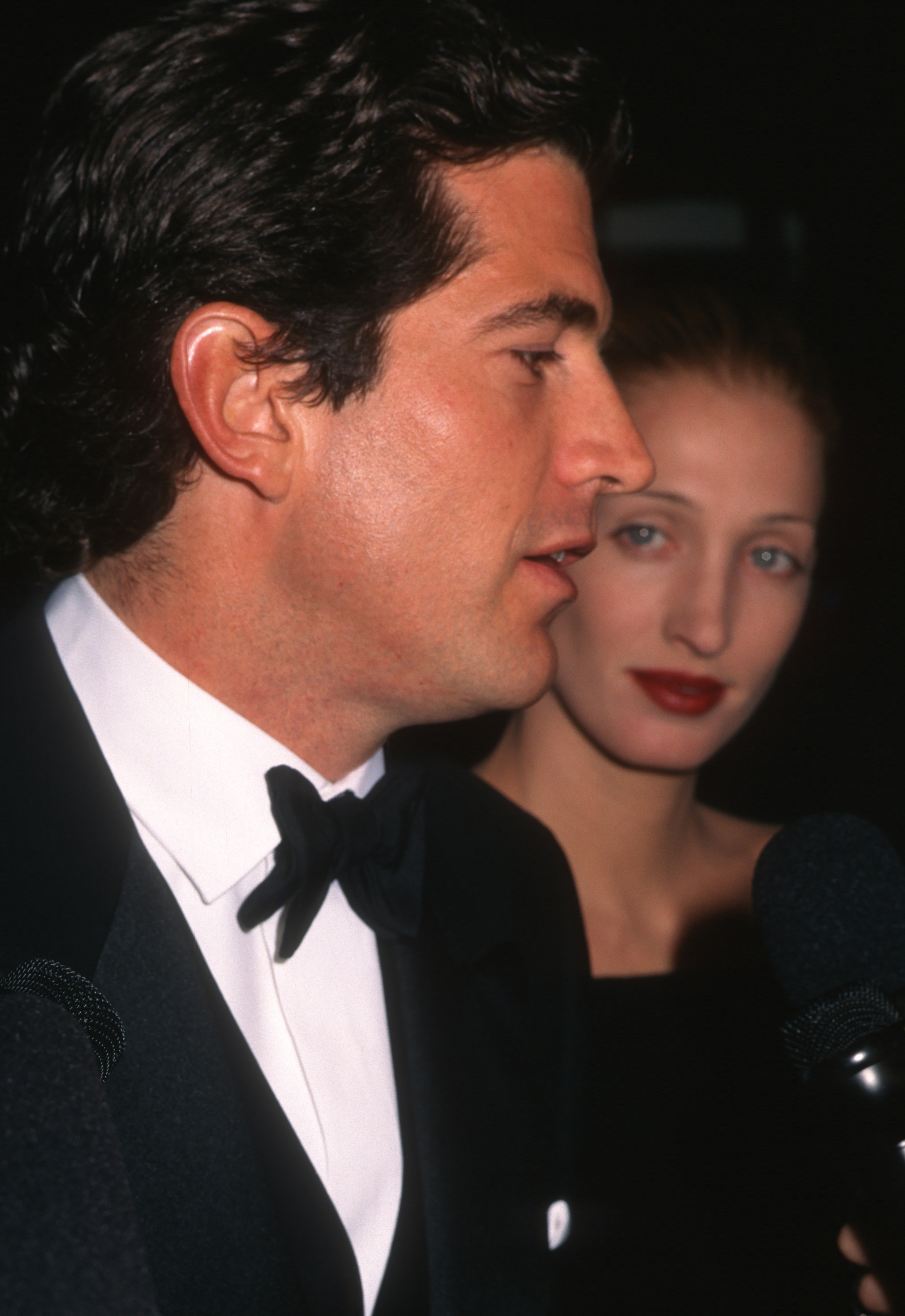 John F. Kennedy Jr. and Carolyn Bessette-Kennedy at the kick-off party for The Warhol Look: Glamour, Style, Fashion event at the Whitney Museum on November 6, 1997, in New York. | Source: Getty Images