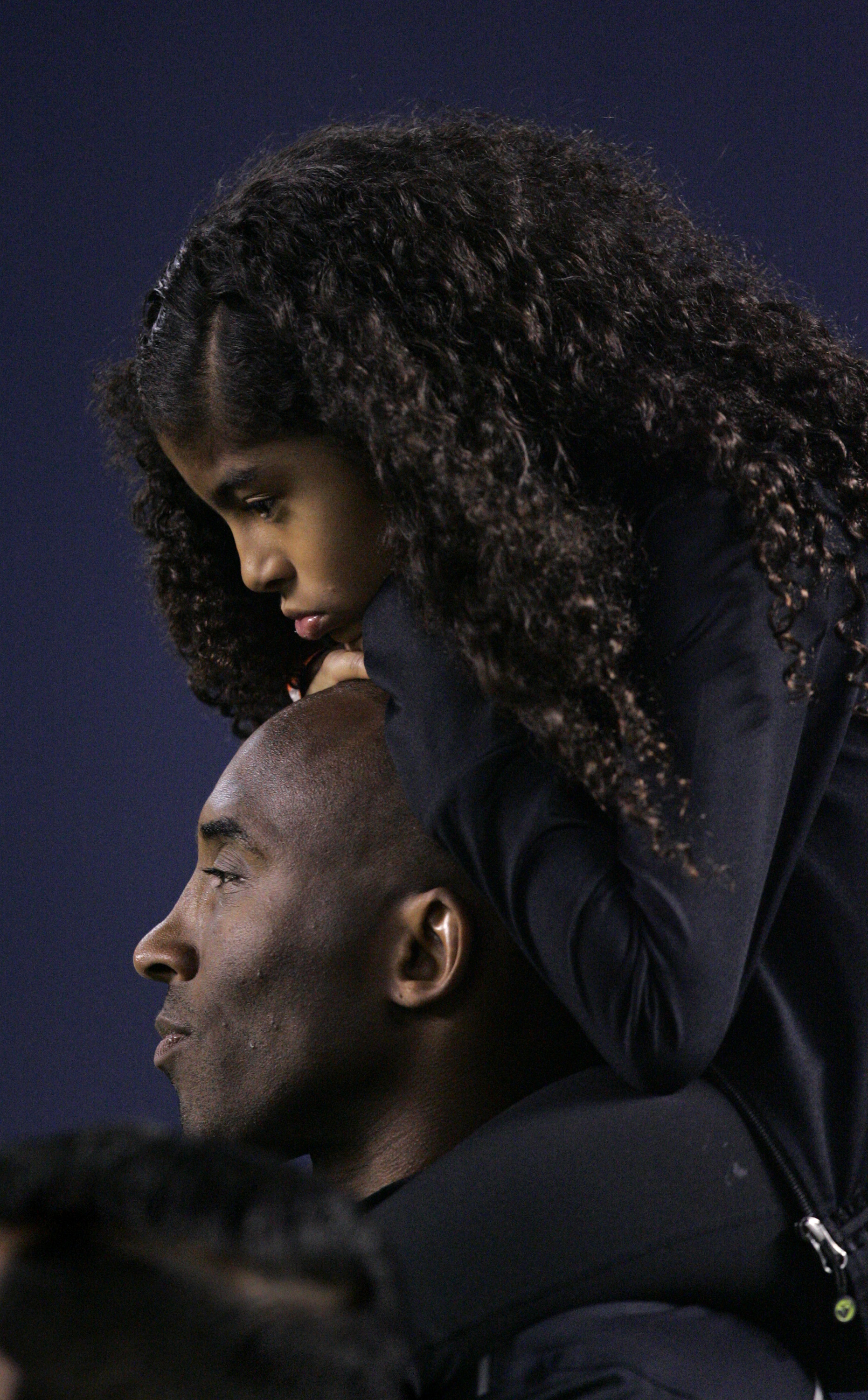 Kobe and Gianna Bryant on the sideline ahead of a game between the United States and China during an international friendly match at Qualcomm Stadium on April 10, 2014, in San Diego, California. | Source: Getty Images