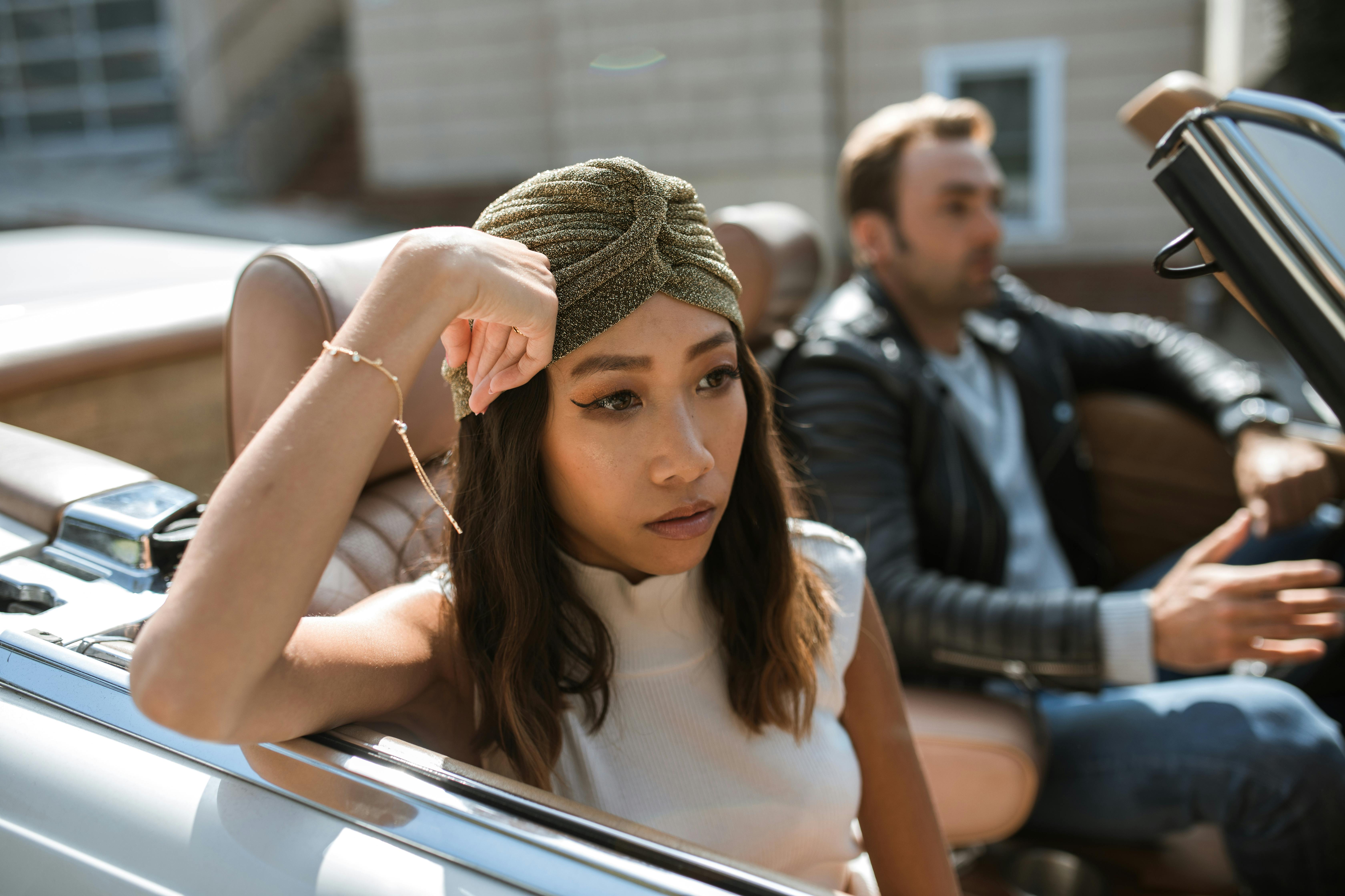 A couple not talking while driving | Source: Pexels